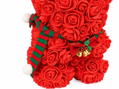 Ours décoratif rouge de Noël en fleurs