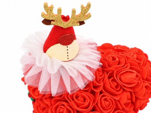 Ours décoratif rouge de Noël en fleurs
